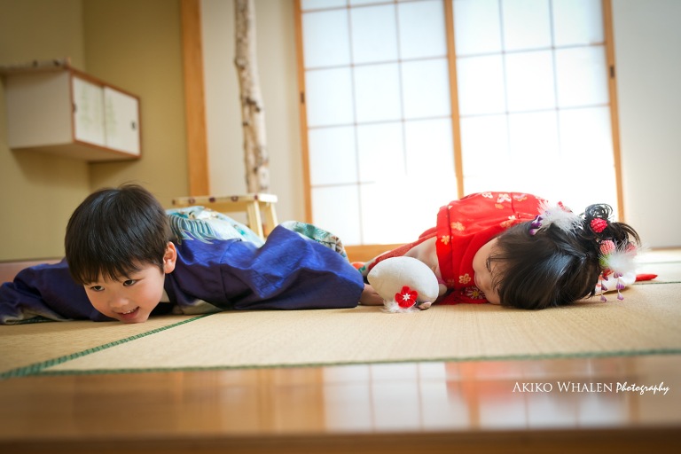 boy and girl in kimonos in Japanese Room, celebrating Shichi Go San,